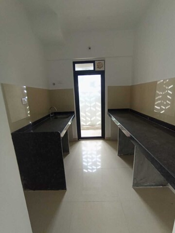 Kitchen in 2 BHK Apartment at Lodha Palava Downtown Dombivli East, Dombivli East – for Rent