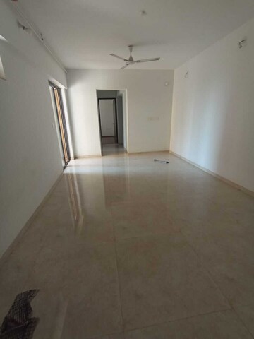 Living Room in 1 BHK Apartment at Lodha Lakeshore Greens, Dombivli East – for Rent