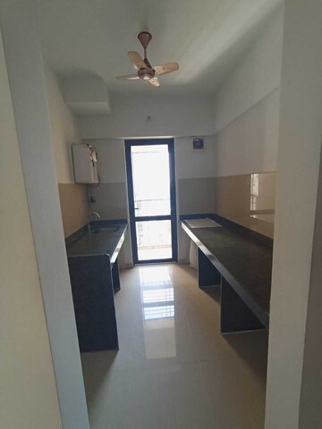 Kitchen in 1 BHK Apartment at Lodha Lakeshore Greens, Dombivli East – for Rent