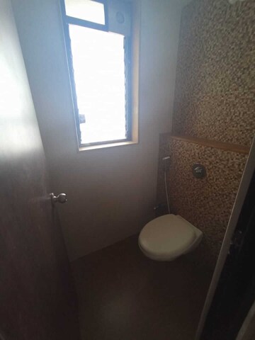 Bathroom in 1 BHK Apartment at Lodha Lakeshore Greens, Dombivli East – for Rent