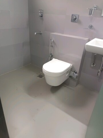 Bathroom in 3 BHK Apartment at Uphaar Homes, Rajendra Park – for Rent