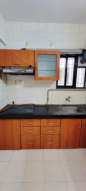 Kitchen in 3 BHK Apartment at Aditi Apartment Bhusari Colony, Kothrud – for Rent