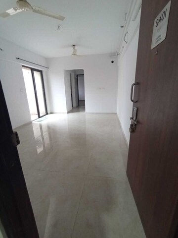 Living Room in 1 BHK Apartment at Lodha Palava City Lakeshore Greens, Dombivli East – for Sale