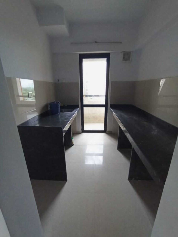 Kitchen, lodha-palava-city-lakeshore-greens 1 Bedroom 516 Sq.Ft. Apartment In Dombivli East Thane 8760016