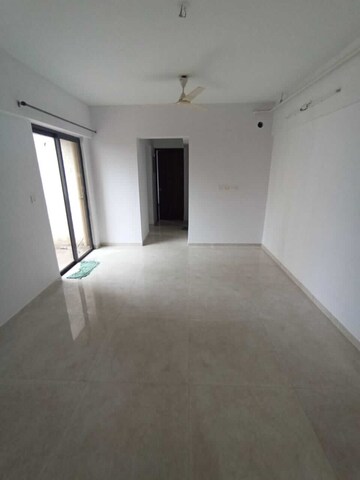 Living Room in 1 BHK Apartment at Lodha Palava City Lakeshore Greens, Dombivli East – for Sale