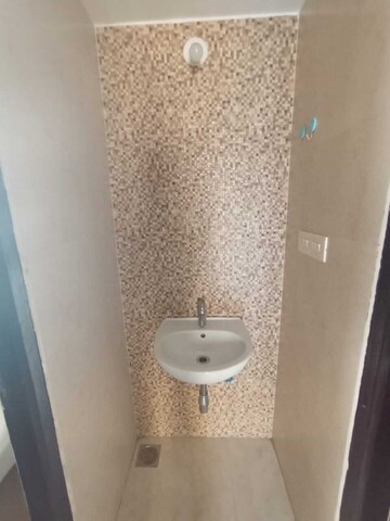 Bathroom in 1 BHK Apartment at Lodha Palava City Lakeshore Greens, Dombivli East – for Rent