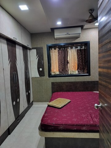 Bedroom in 2 BHK Apartment at Madhavi CHS, Nerul – for Rent