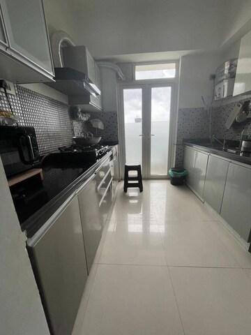 Kitchen in 2 BHK Apartment at Omkar Alta Monte, Malad East – for Sale