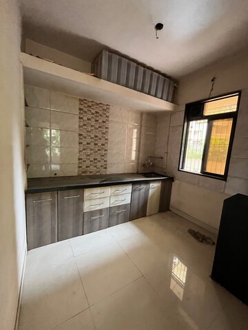 Kitchen in 2 BHK Apartment at Sai Gaurav Kalyan, Tawri Pada – for Sale