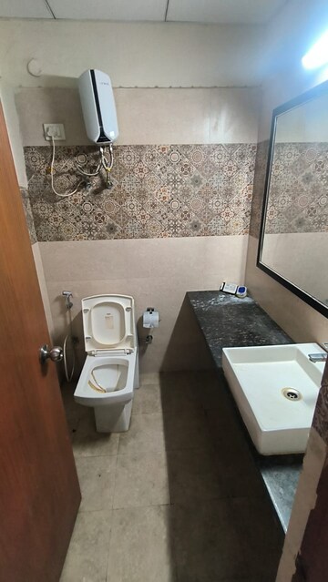 Bathroom in 1 BHK Apartment at Paramount Golfforeste, Zeta I Greater Noida – for Rent