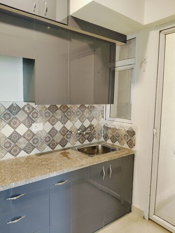 Kitchen in 2 BHK Apartment at Signature Global Proxima, Sector 89 – for Rent