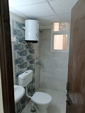Bathroom in 2 BHK Apartment at Signature Global Proxima, Sector 89 – for Rent