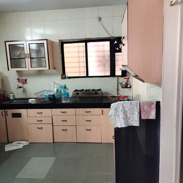 Kitchen in 2 BHK Apartment at Woodland Avenue, Kothrud – for Sale
