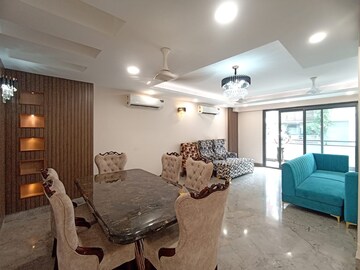 Living Room in 4 BHK Apartment at Greater Kailash – for Rent