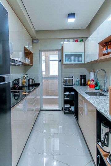 Kitchen in 3 BHK Apartment at Devidayal Apartments, Mulund West – for Rent