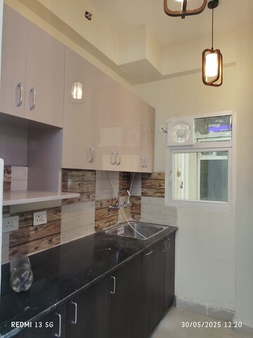 Kitchen in 2 BHK Apartment at Tech Zone 4 Greater Noida – for Rent