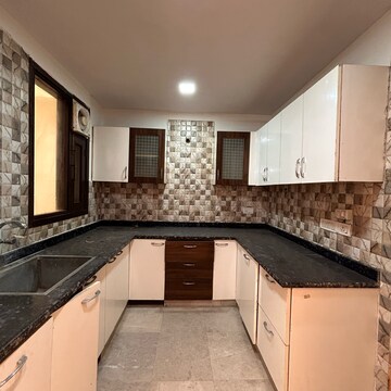 Kitchen in 3 BHK Builder Floor at Palm Residency Chhatarpur, Rajpur Khurd Extension – for Sale