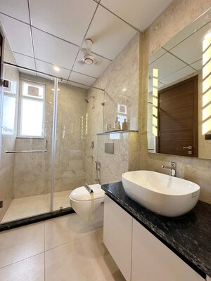 Bathroom in 4 BHK Builder Floor at Auram Floor, South City 2 – for Sale
