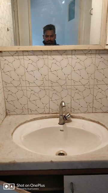 Bathroom in 2 BHK Apartment at Nirmiti Sanket, Paud Road – for Rent