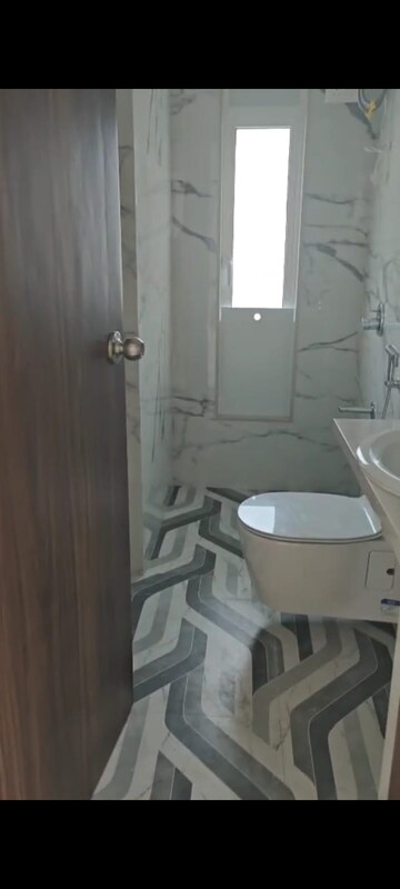 Bathroom in 1 BHK Apartment at Gomantak CHS, Navpada – for Rent