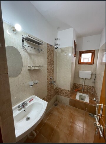 Bathroom in 3.5 BHK Apartment at Eldeco Green Woods, Gomti Nagar – for Rent