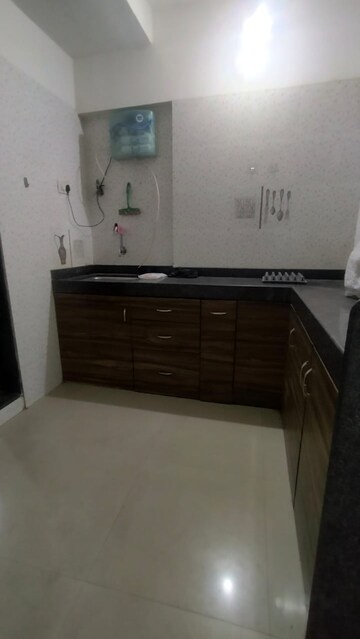 Kitchen in 2 BHK Apartment at Solitaire Heights, Malad West – for Rent