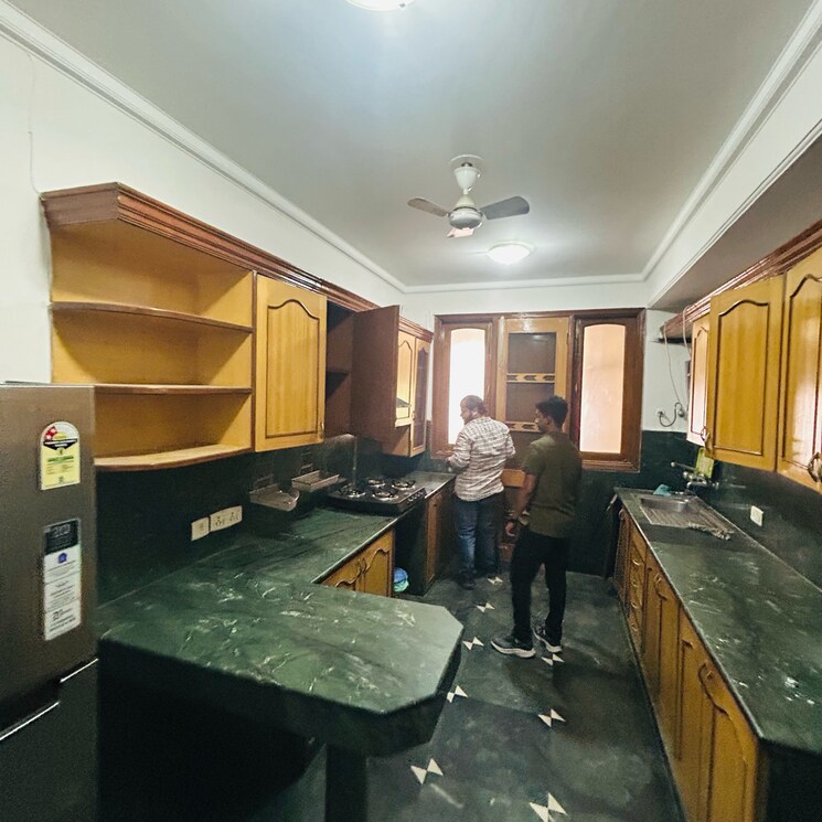 Kitchen, ambience-island-lagoon 3 Bedroom 2500 Sq.Ft. Apartment In National Media Center Gurgaon 8761367