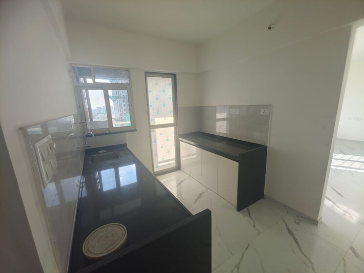 Kitchen, engineers-ios 3 Bedroom 1050 Sq.Ft. Apartment In Tathawade Pune 8761376