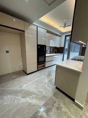 Kitchen in 4 BHK Builder Floor at Auram Floor, South City 2 – for Sale