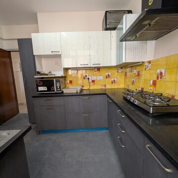 Kitchen in 2.5 BHK Apartment at Suncity Essel Tower, Maruti Vihar – for Rent