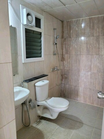 Bathroom in 3 BHK Apartment at Mantri Webcity, Hennur – for Rent
