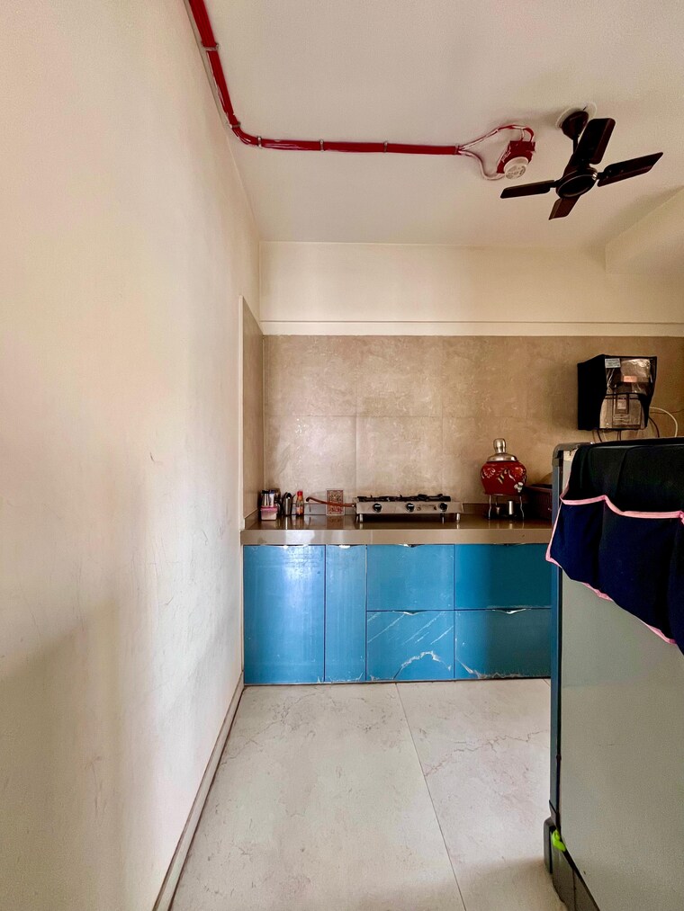 Kitchen, dosti-west-county-phase-4-dosti-pine 1.5 Bedroom 556 Sq.Ft. Apartment In Balkum Pada Thane 8761600