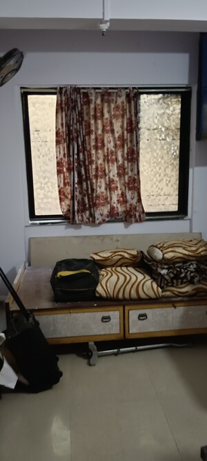 Living Room in 1.5 BHK Apartment at Kalyan West – for Sale