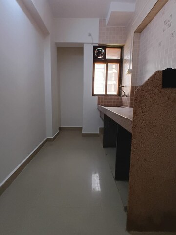 Room in 2 BHK Apartment at Parsik Nagar – for Sale