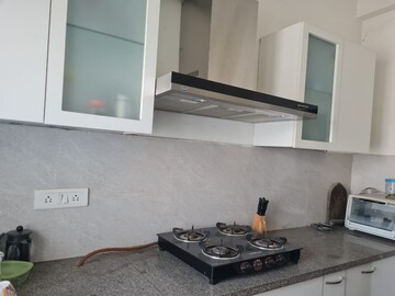 Kitchen in 3 BHK Apartment at Puri Aman Vilas, Sector 89 – for Rent