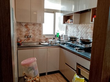 Kitchen in 2 BHK Apartment at Amrapali Enchante, Tech Zone 4 Greater Noida – for Rent