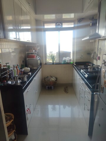 Kitchen in 2 BHK Apartment at Rustomjee Athena, Majiwada – for Rent