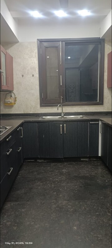 Kitchen in 3 BHK Builder Floor at Sarvodaya Enclave – for Rent