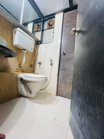 Bathroom in 2 BHK Apartment at Hiranandani Meadows, Manpada – for Rent