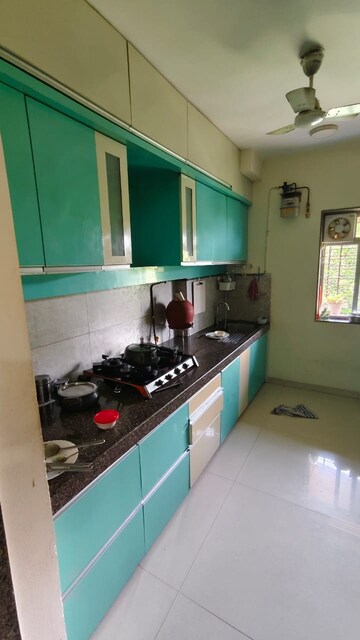 Kitchen in 3 BHK Apartment at Kalpataru Hills, Manpada – for Rent