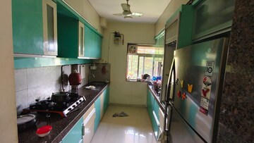 Kitchen in 3 BHK Apartment at Kalpataru Hills, Manpada – for Rent
