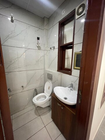 Bathroom in 3 BHK Builder Floor at Shakti Khand 2 – for Sale