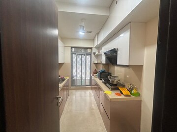 Kitchen in 3 BHK Apartment at Piramal Vaikunth, Balkum Pada – for Rent