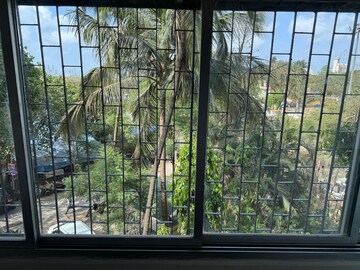 Balcony in 2 BHK Apartment at Nirman Kutir, Yari Road – for Rent