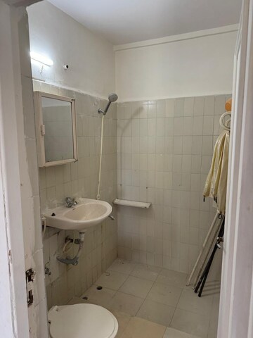 Bathroom in 2 BHK Apartment at Nirman Kutir, Yari Road – for Rent