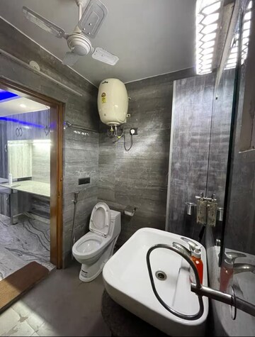 Bathroom in 4 BHK Builder Floor at Greater Kailash I – for Rent