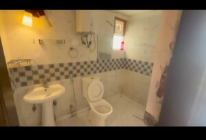 Bathroom in 2 BHK Apartment at Bankey Bihari Aggarwal Heights, Raj Nagar Extension – for Sale