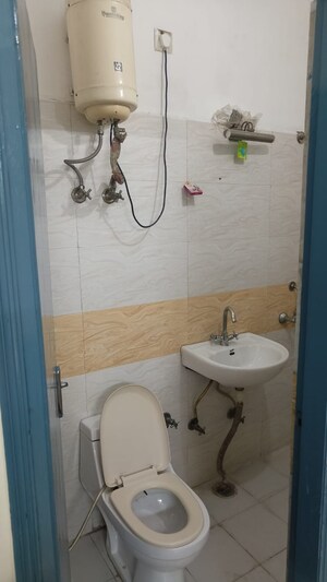 Bathroom in 3 BHK Builder Floor at Shyam Park Extension – for Sale