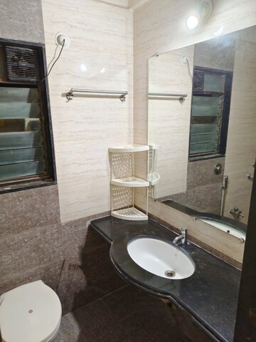 Bathroom in 2 BHK Apartment at Hyde Park CHS, Kharghar – for Sale