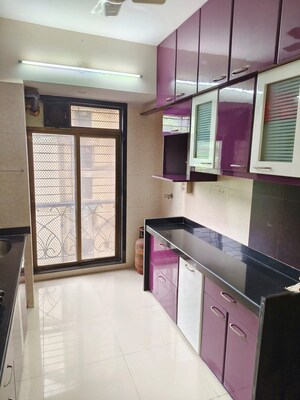 Kitchen in 2 BHK Apartment at Hyde Park CHS, Kharghar – for Sale